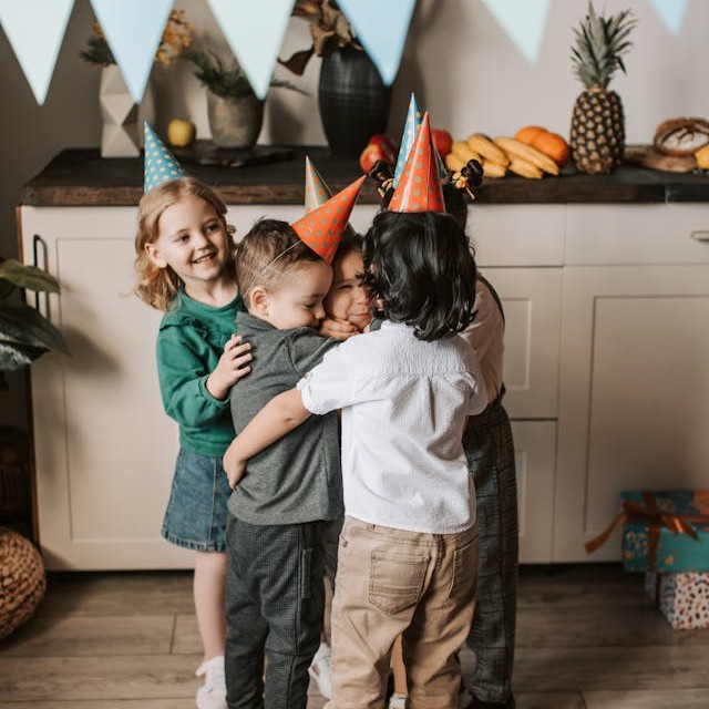 Group of children playing together in a social-skills session